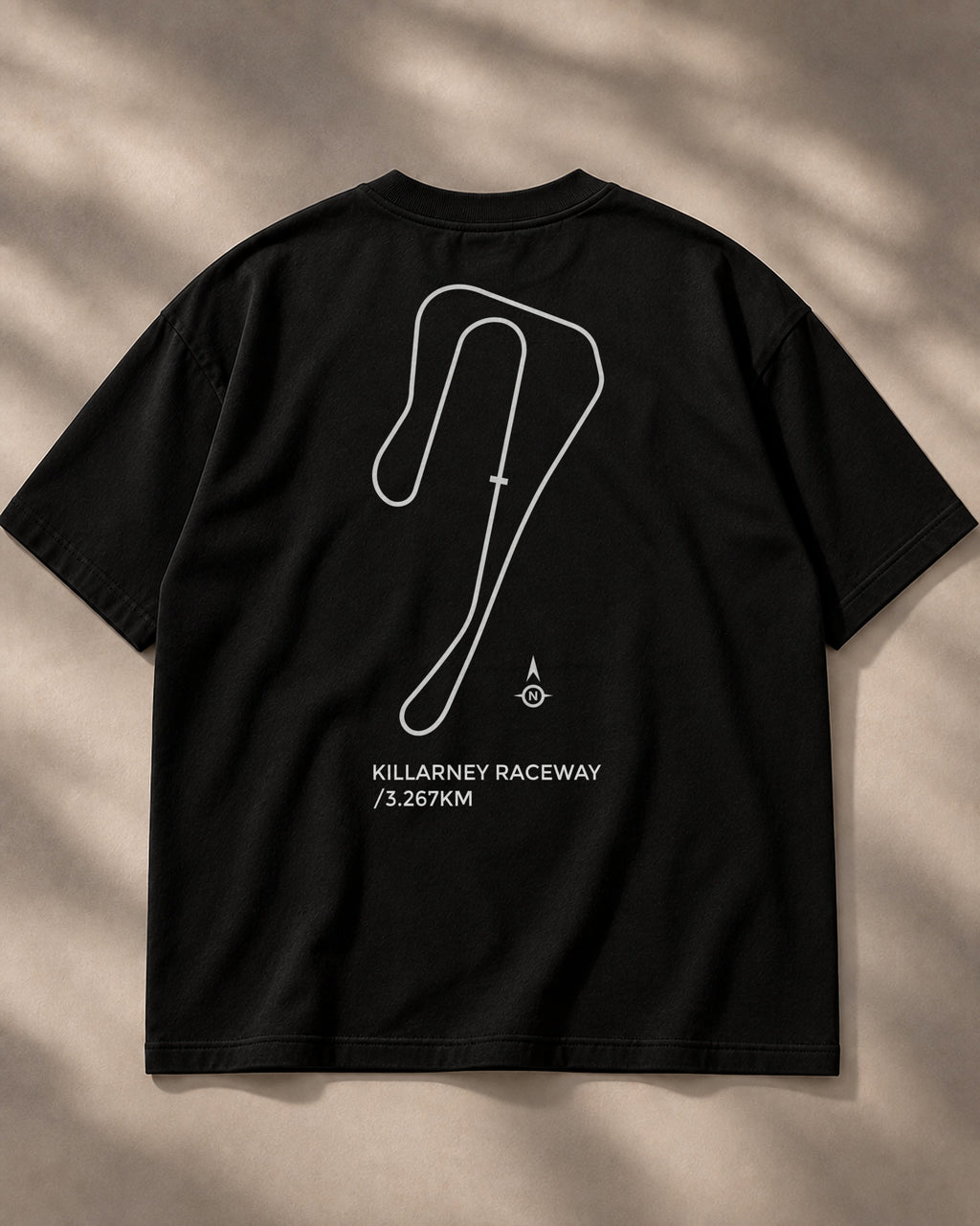 Circuit 001 Track Only tee in black, laid flat from the back: the Killarney Raceway circuit as one clean line, printed in white