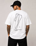 Circuit 001 Detailed tee in white, worn from the back: the Killarney Raceway map with every corner numbered and named, printed in black