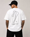 Circuit 001 Track Only tee in white, worn from the back: the Killarney Raceway circuit as one clean line, printed in black
