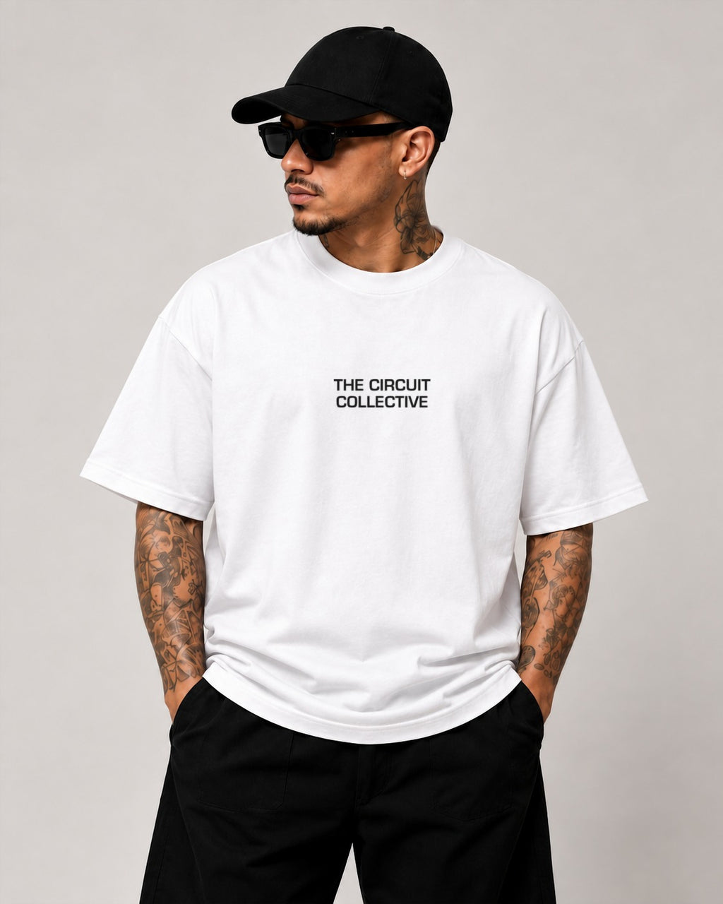 Circuit 001 Track Only tee in white, worn from the front: The Circuit Collective wordmark in black on the chest